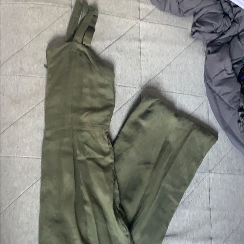 Green zip up jump suit